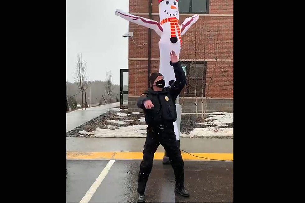 WATCH Maine Cop Dances With Tube-man & Reminds Us To Smile
