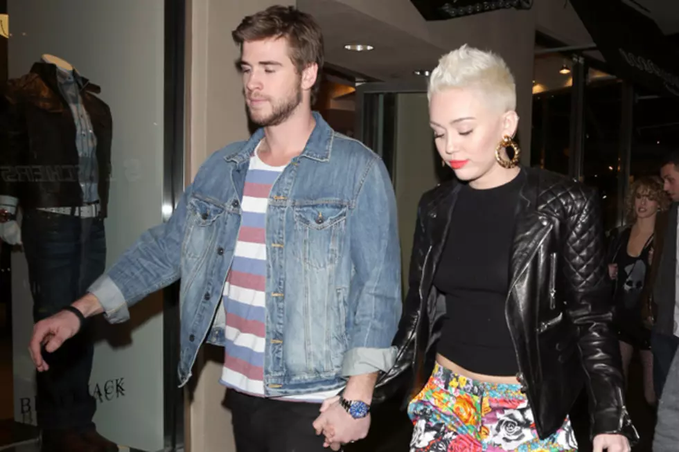 Miley Cyrus + Liam Hemsworth Reunite in Canada But Don’t Look Too Thrilled About It [PHOTOS]