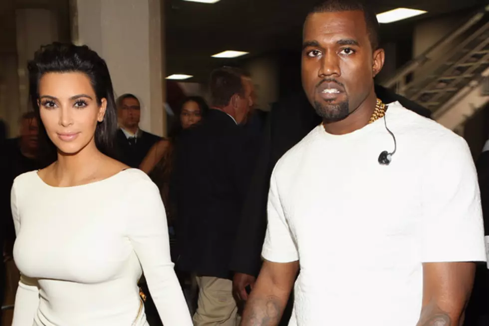 Kim Kardashian Pregnant, Kanye West Announces News of His First Child Onstage