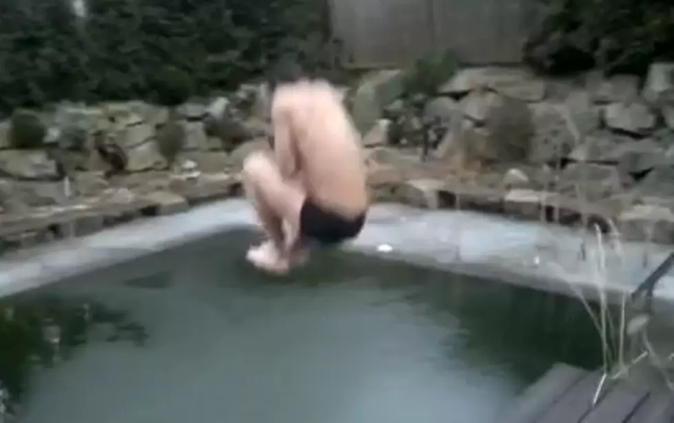 Epic Fail! Dude Tries To Jump Into A Frozen Pool [Video]