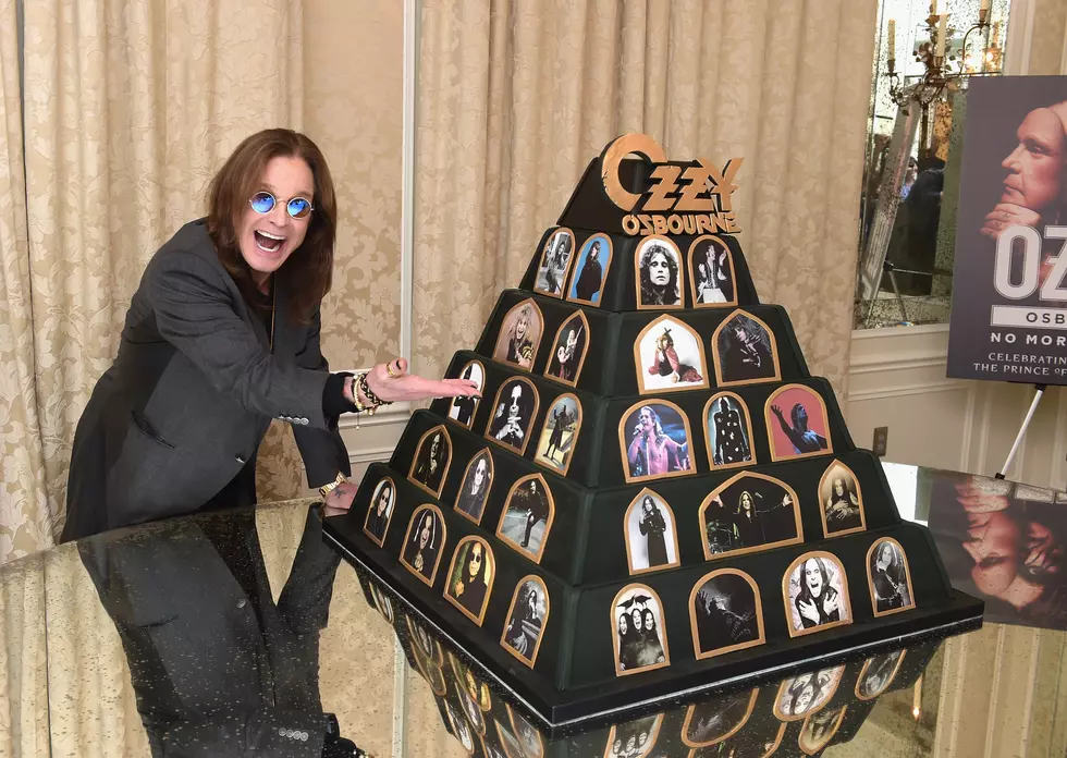 Ozzy Osbourne Holding Best Ozzy Costume Contest For Halloween