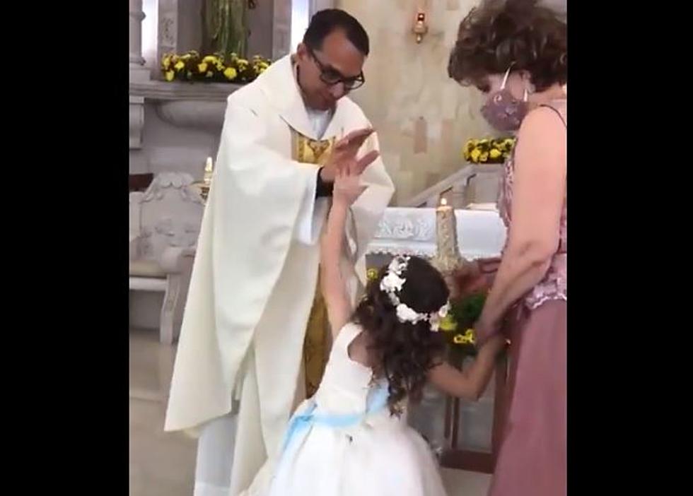 El Paso Catholics Can Laugh at Little Girl's Funny Move on Priest