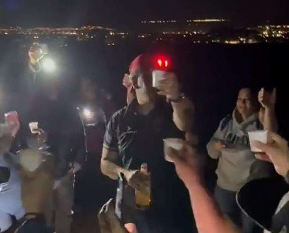 This El Paso Hiking Group Enjoys Having a Toast at the Top