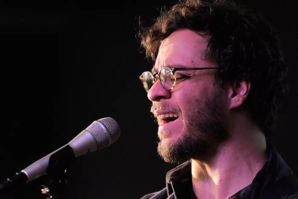 Win an Acoustic Guitar Signed by Amos Lee
