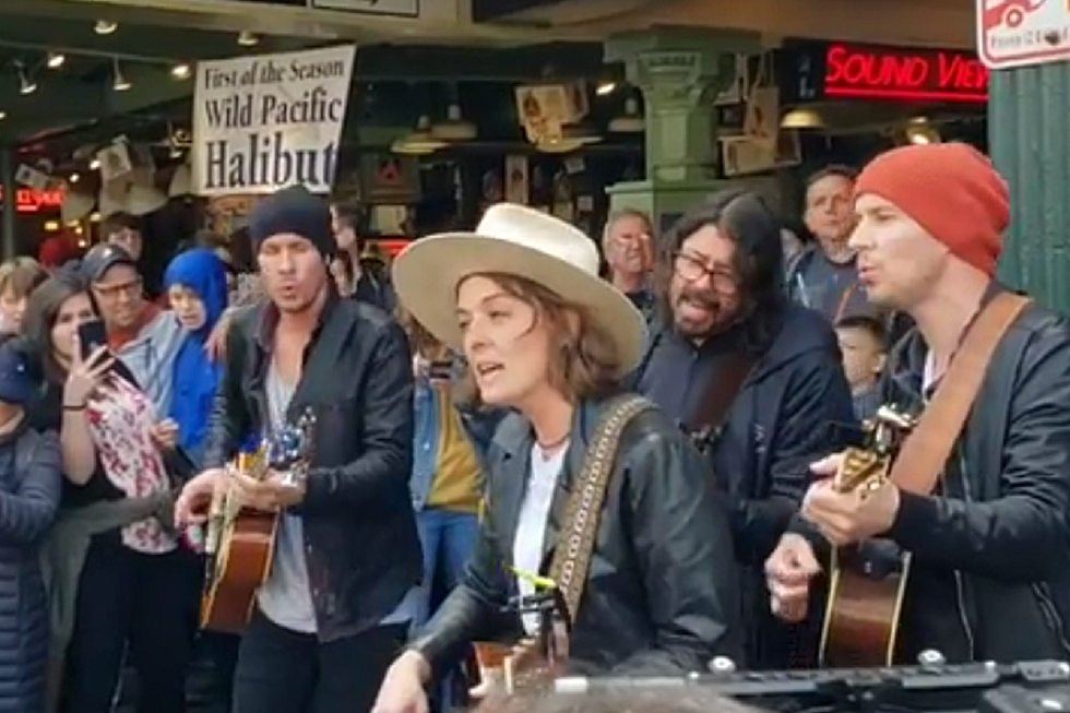 Watch Brandi Carlile, Dave Grohl Busk at Seattle’s Pike Place Market, Cover the Beatles