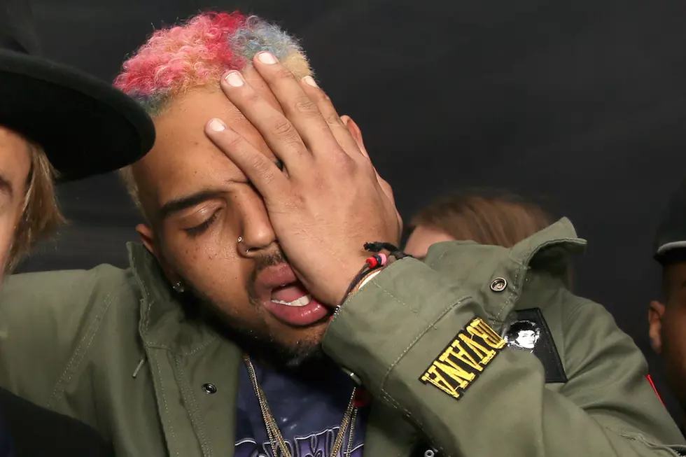 Chris Brown Confronts Naked Home Intruder After She Vandalized His Vehicles [PHOTO]
