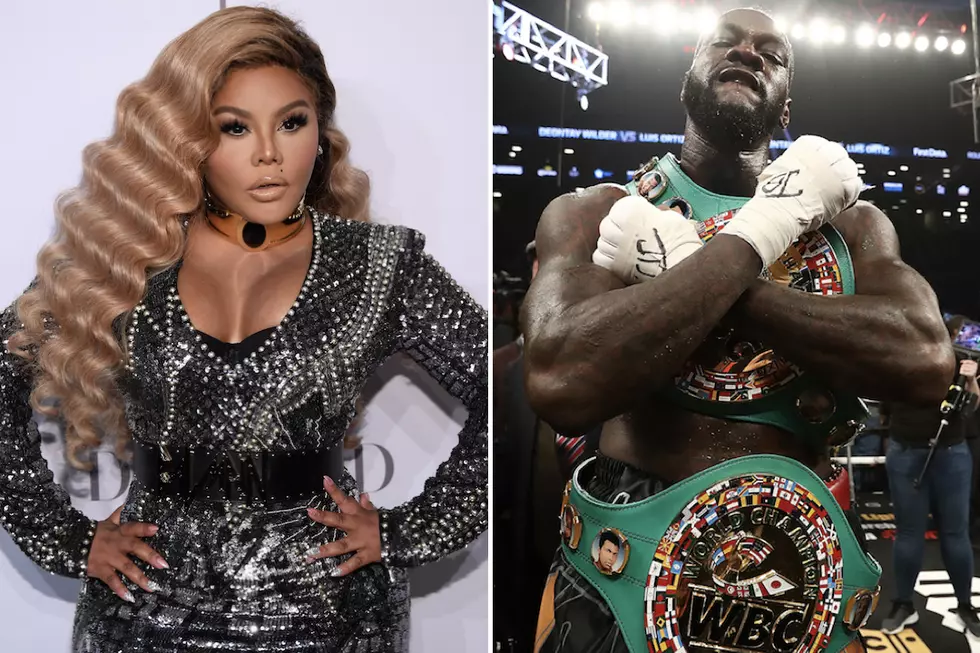 Lil’ Kim Walks Out With Deontay Wilder While Performing ‘Spicy’ [VIDEO]