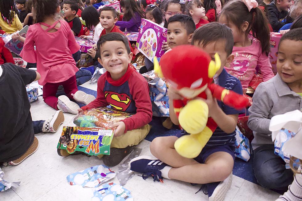 The Great Khalid Foundation Plays Santa at Whitaker Elementary