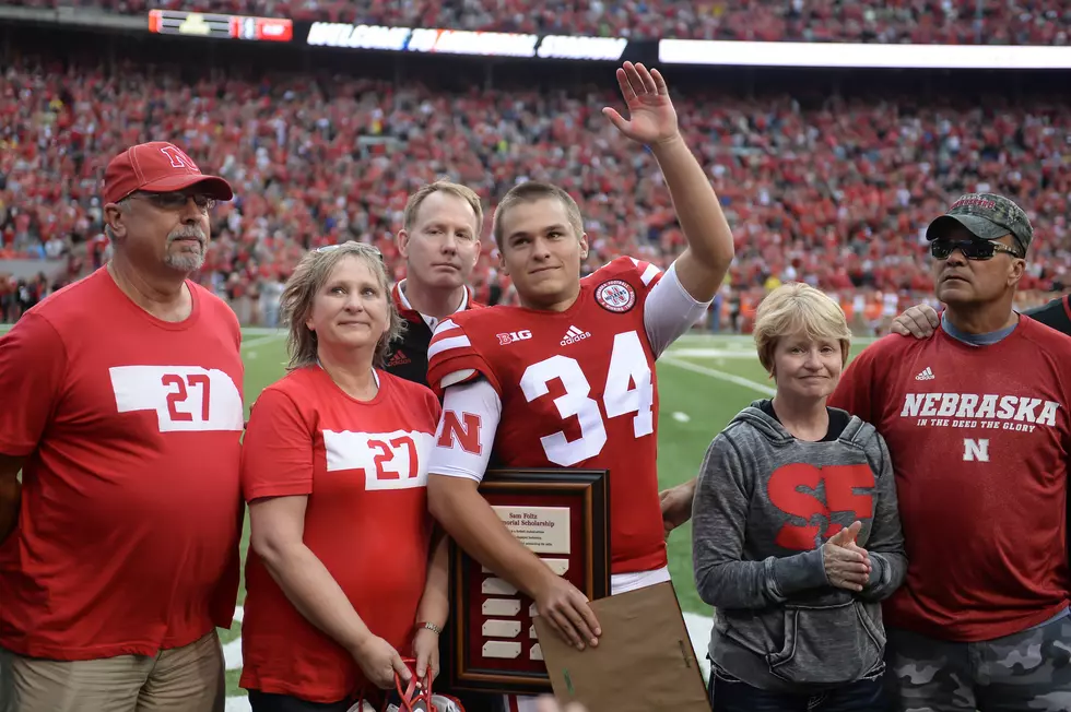 Punter Killed Honored by Nebraska; Family Robbed During the Game