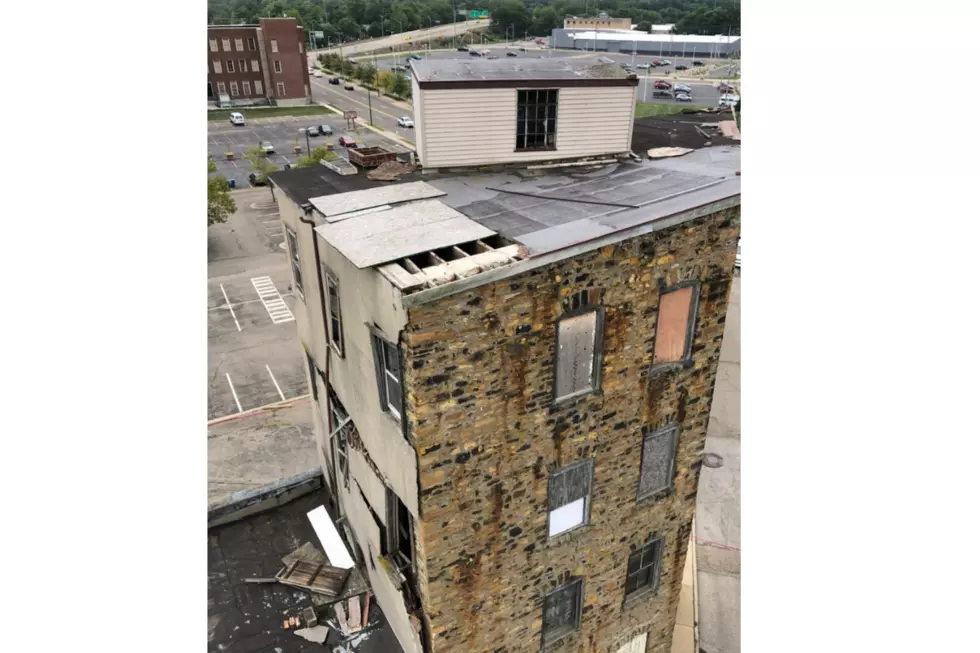 Businesses Re-Open Around Crumbling Building