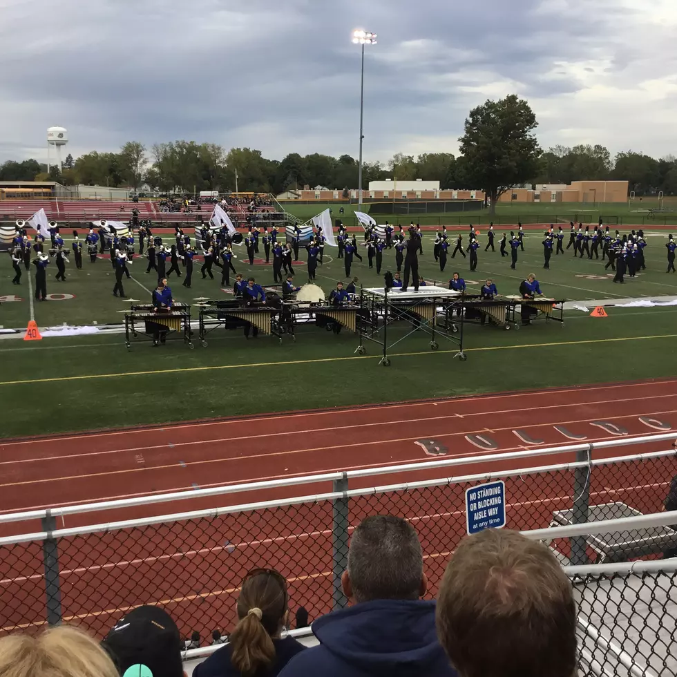 Portage Central Band Members Sat During The National Anthem