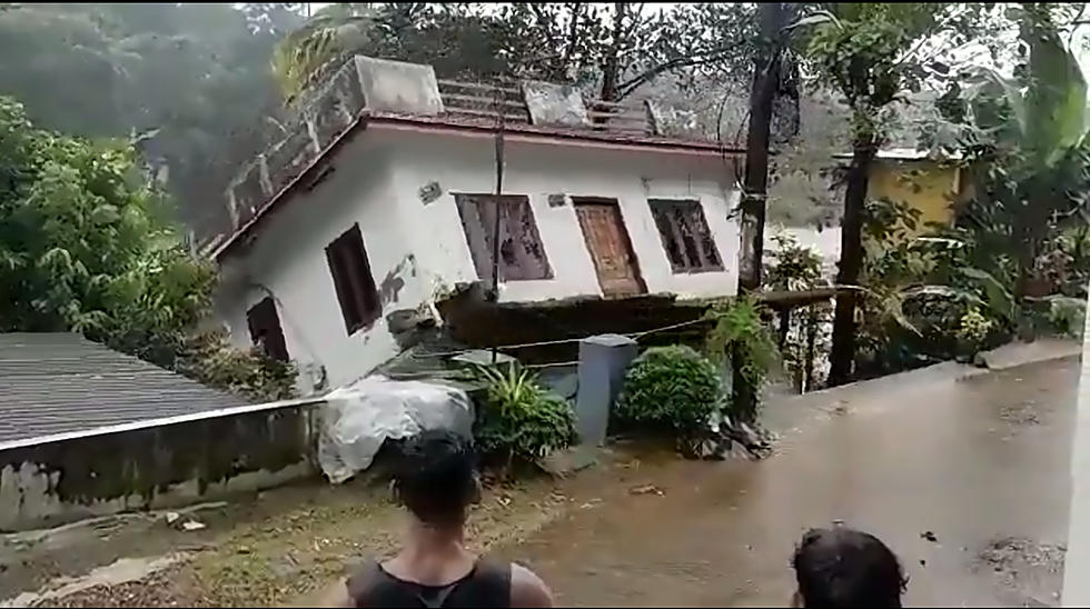 Have You Ever Seen An Entire House Slide Into A River? This You Have To See