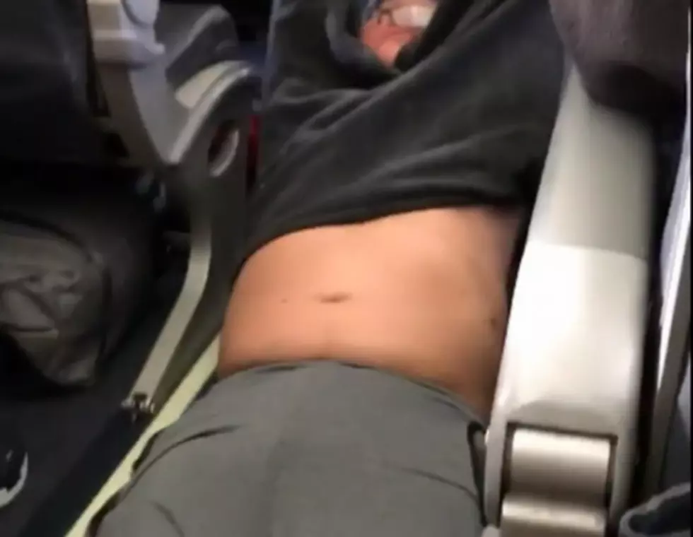 Unseen Footage Of Man Dragged Off Plane
