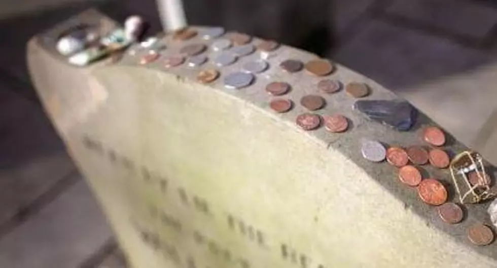 What Do Coins Left On Military Headstones Mean?