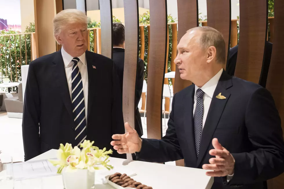 The Latest: Russia Defends Account of Trump-Putin Meeting