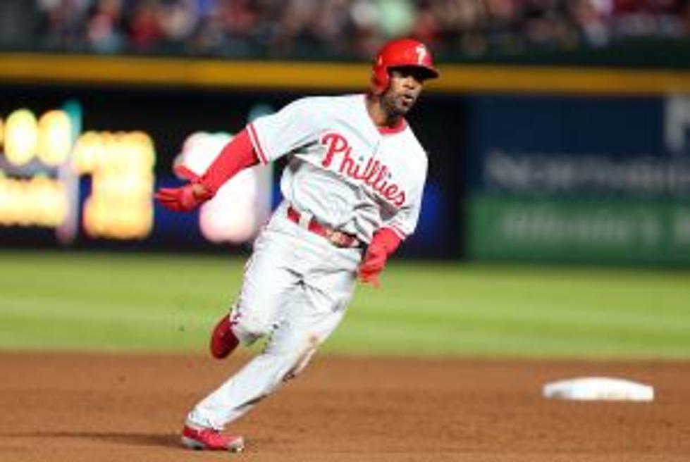Rollins Homers and Phils Top Twins 5-1