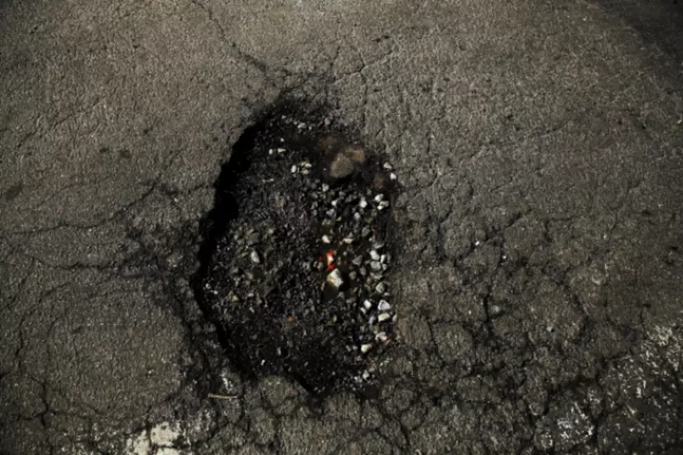 As Snow Disappears, Pot Holes Spring Up [AUDIO]