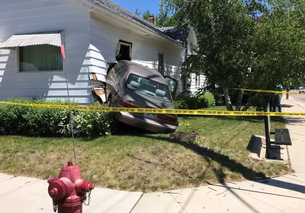 Car Jumps Curb and Crashes into St. Cloud House