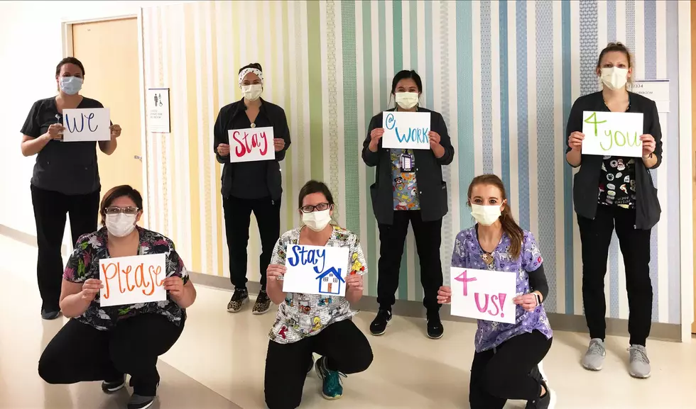 Iowa Nurses Send Powerful Visual Message: “Stay Home For Us”