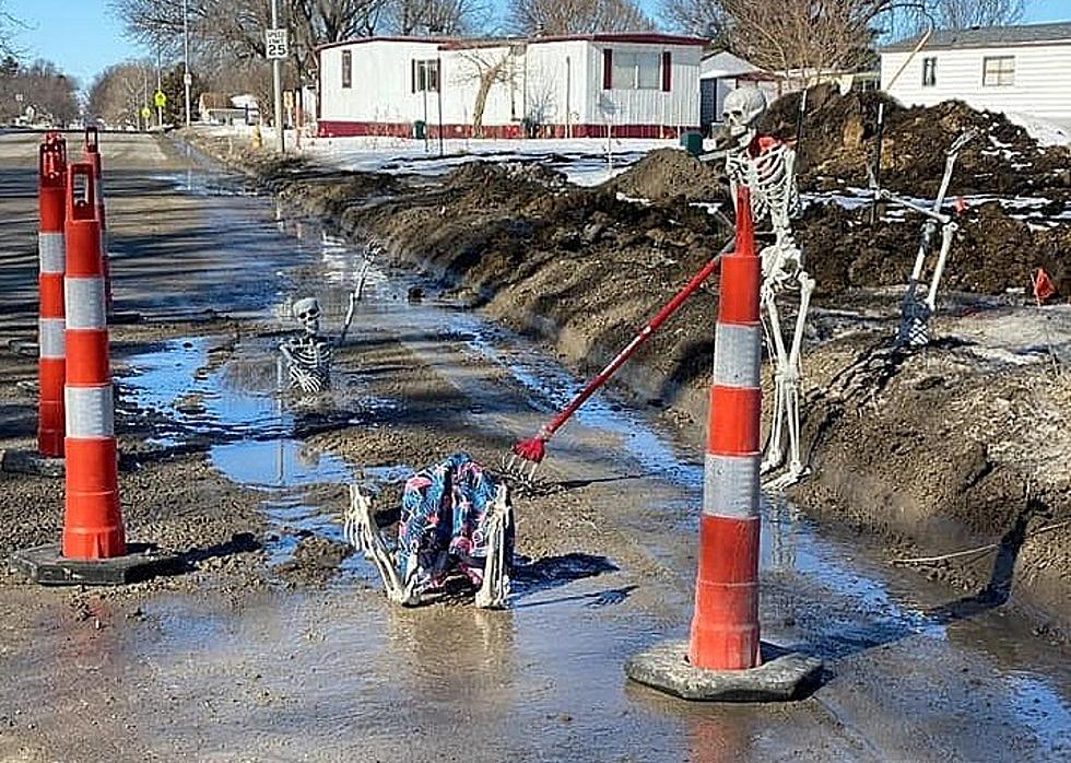 Iowa Woman’s Skeleton Crew Bringing Attention To Street Repair Need [PHOTOS]