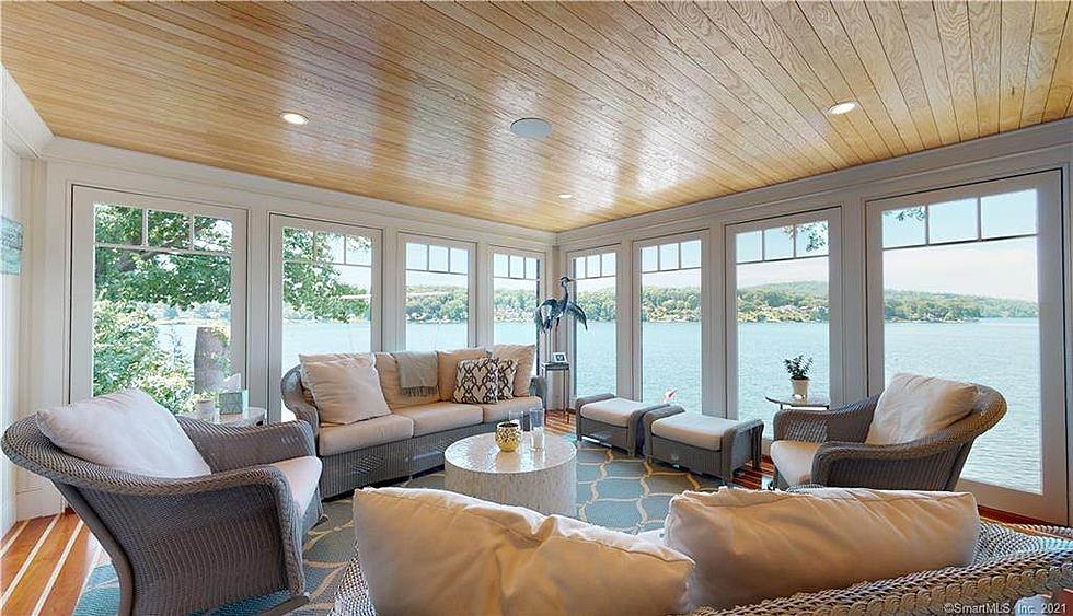 4-Story Lakefront Danbury Home Features an Elevator and Two Lakeside Patios