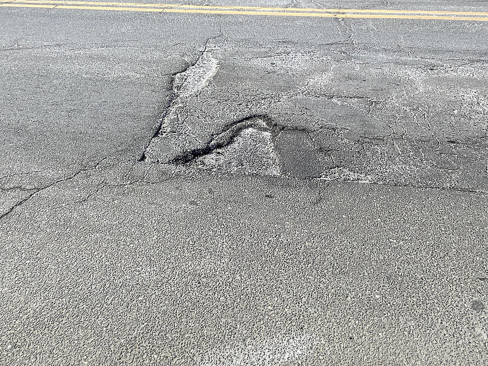 The Potholes on Danbury’s Shelter Rock Road are Devastating + Frustrating