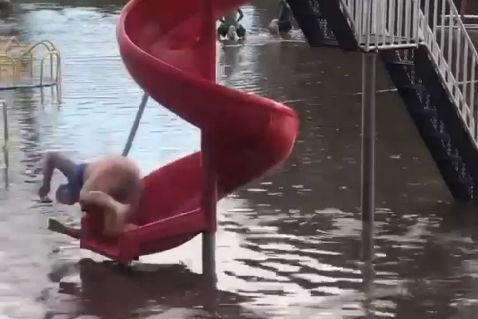 Video of MN Woman on Flooded Park Slide Goes Viral