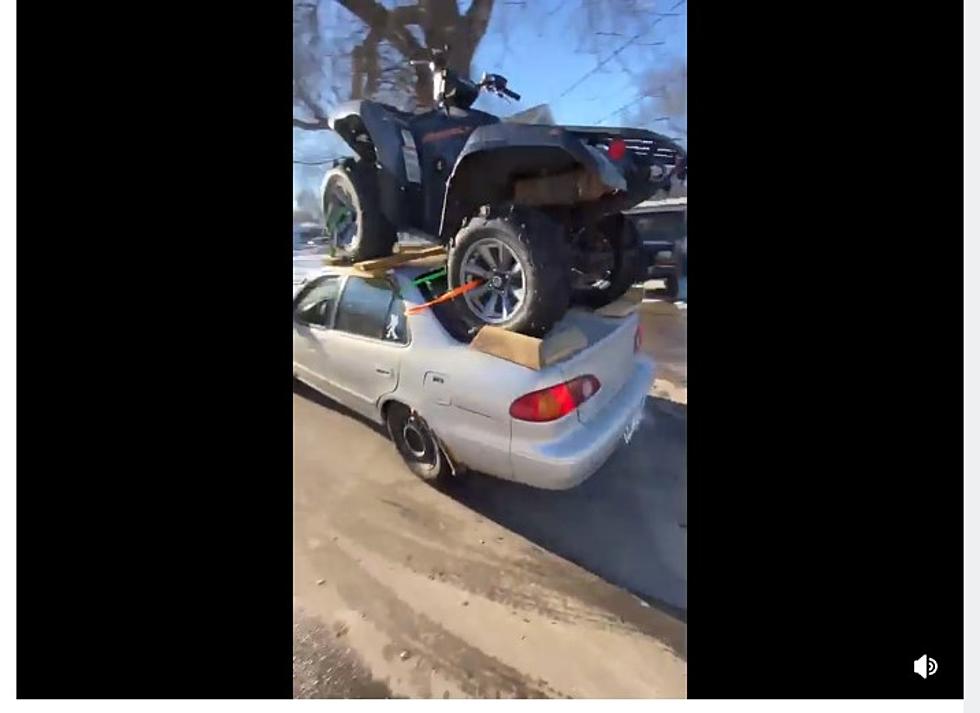 How? See [Video] of ATV on Top of Car in Minnesota Driving Around