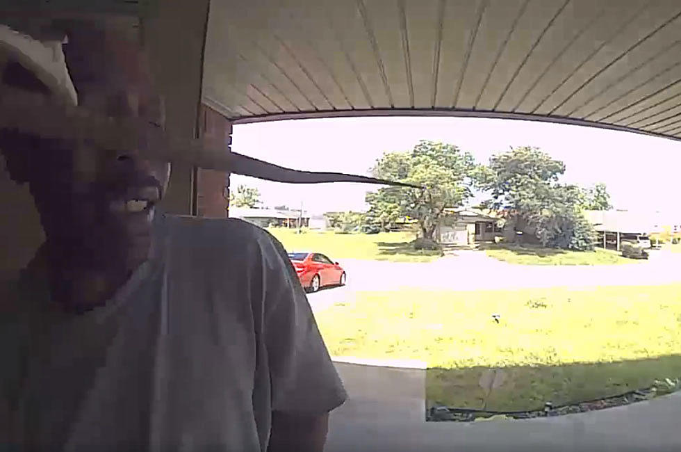 WATCH: Man Opening A Door Gets Bit In The Face By A 5 Foot Snake!