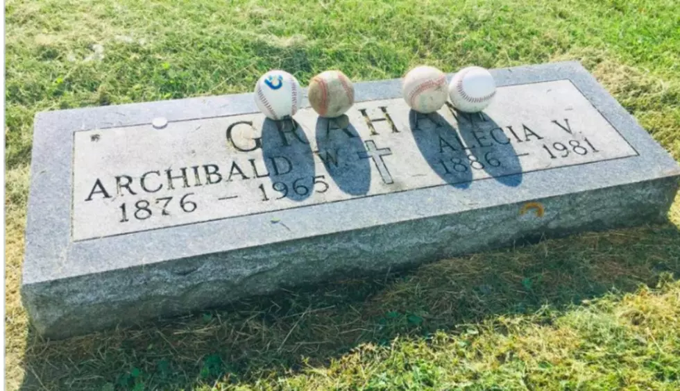Why Are People Leaving Baseballs On This Rochester Gravestone?