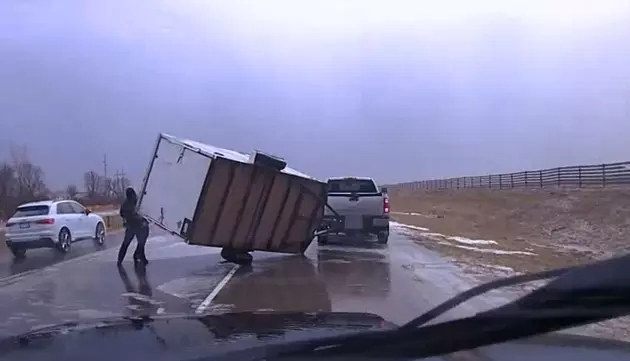 Deputy Helps Minnesota Driver Flip Trailer Back Over After Wind Blows It Over