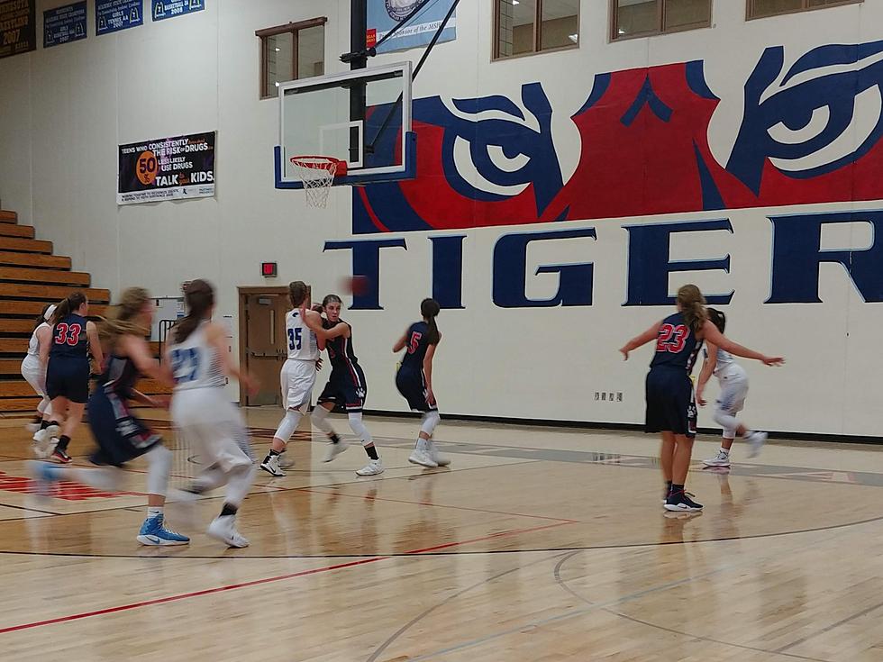 Huskies Top Tigers in Pair of Close Basketball Games