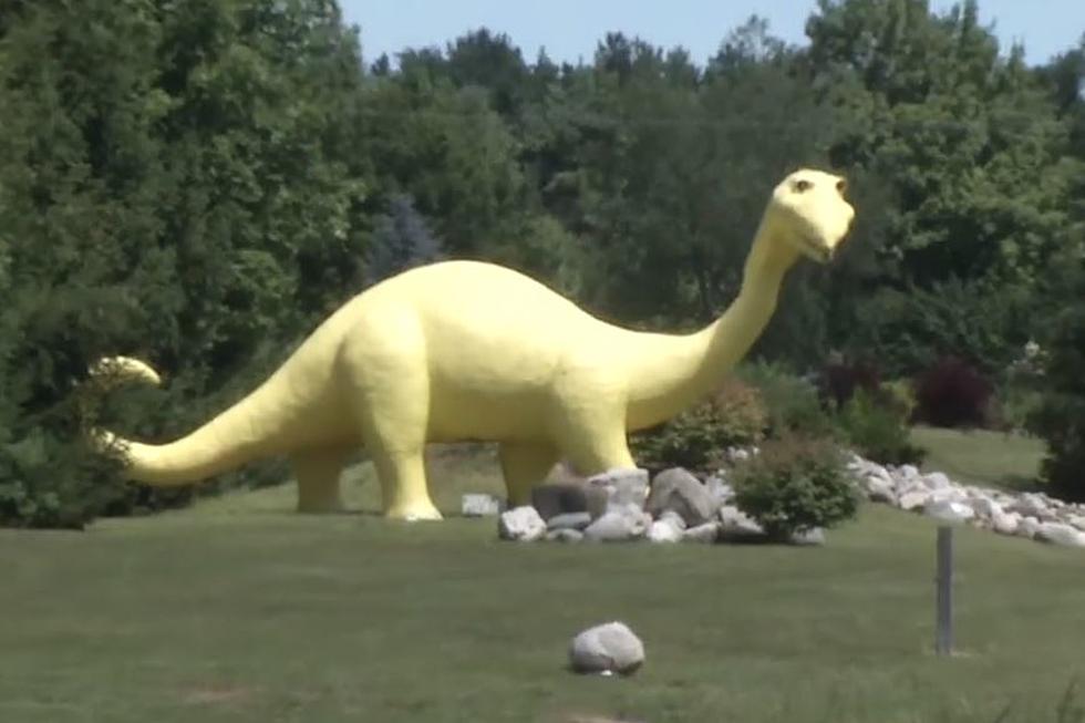 Yellow Dino Welcomes Visitors To Kampvilla RV Park In Bear Lake