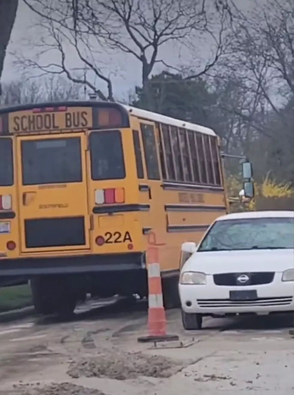 Michigan School Bus Drives Thru Wet Concrete and Leaves a Mess