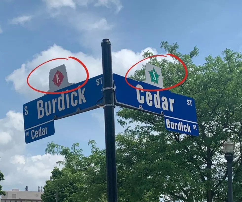 What do the Letters on Top of Kalamazoo Street Signs Mean?