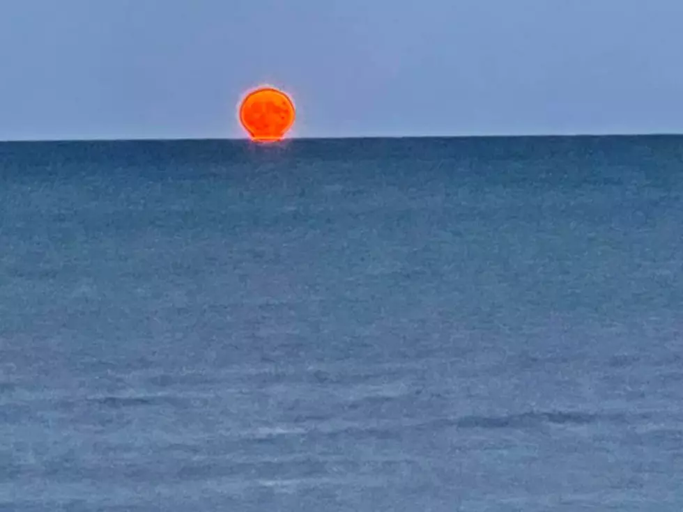 No, That’s Not The Sun! Check Out This Incredible Moonrise Over Whitefish Bay