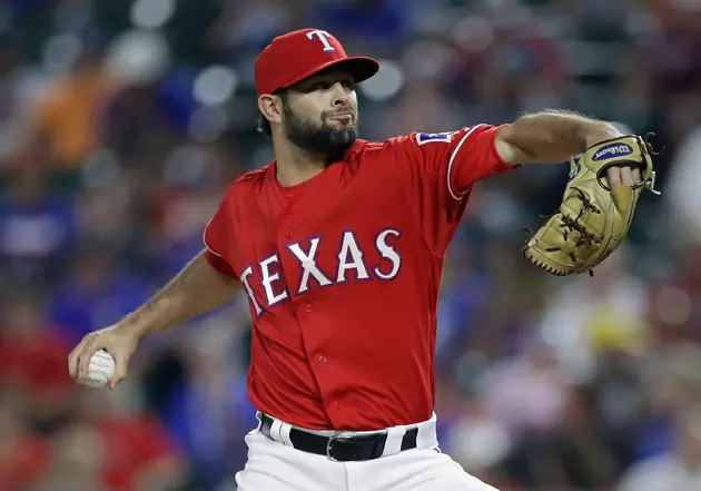 Watch Rangers Pitcher Make A Behind The Back Catch For A Double Play