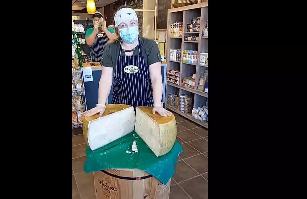 You&#8217;ll Never Want Stuff Out of the Green Can Again After Watching the Kalamazoo Cheese Lady Crack a Wheel of Aged Parmesan Cheese