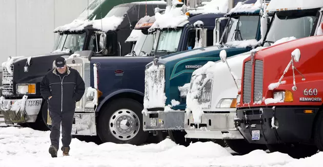 Should Michigan Semi Trucks Be Ticketed For Not Clearing Off Snow?