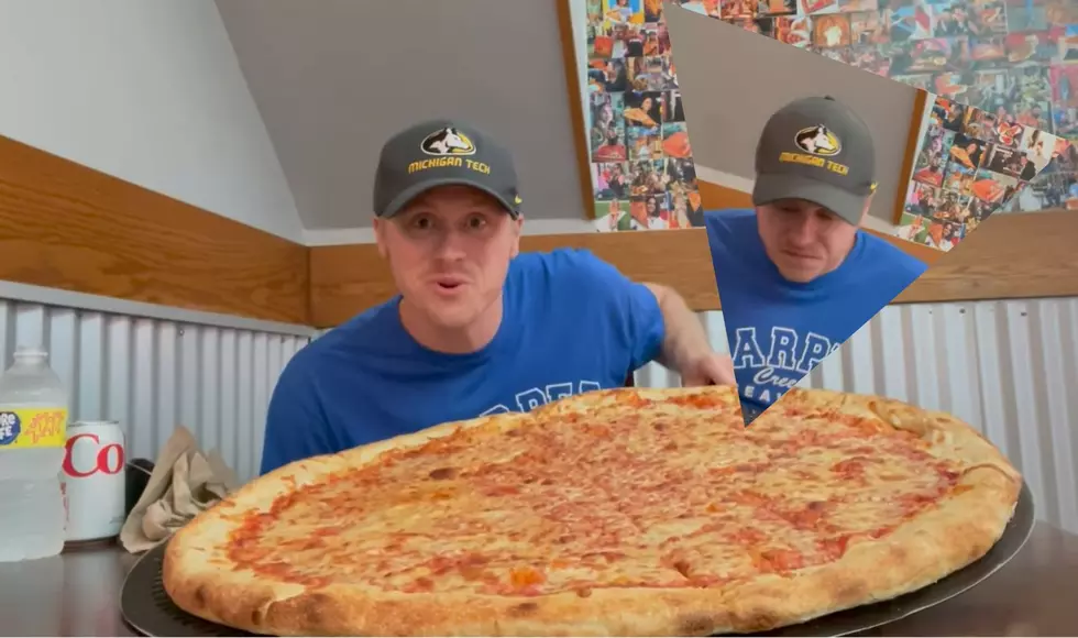 Battle Creek Competitive Eater Eats 28" Pizza at Benny DiCarta's 