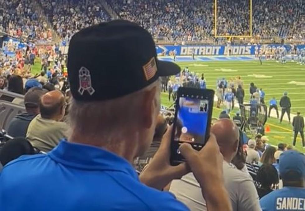 VIDEO: Old Man Takes Pictures of Lions Cheerleader's Butt At Game