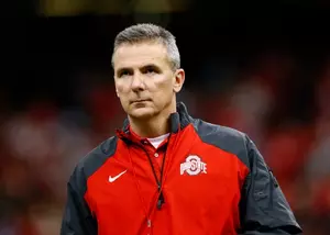 Michigan Fan Leaves Present For OSU Coach Urban Meyer &#8211; In His Front Yard