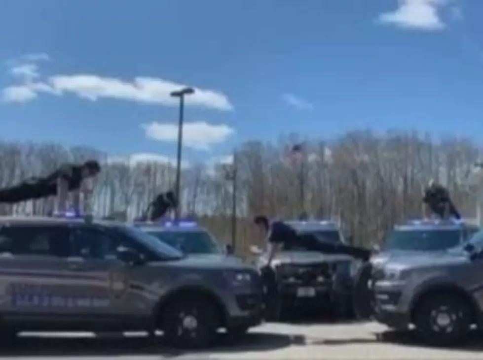 Maine Police Officers Do Push-ups On Cruisers For A Good Cause