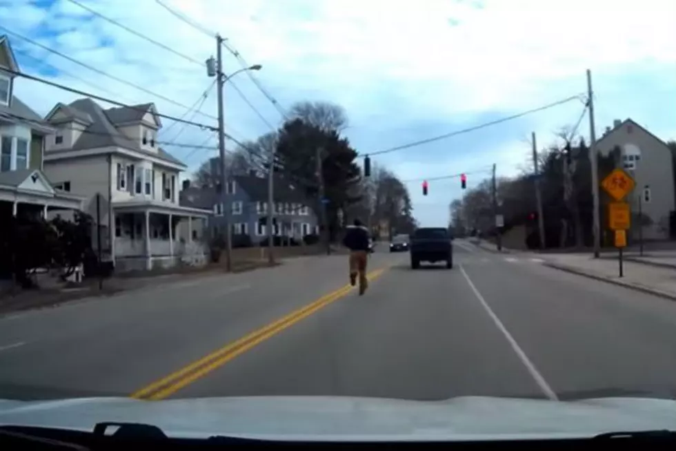 WATCH: Guy Runs Up and Down Brighton Avenue in Portland Right in the Middle of Traffic