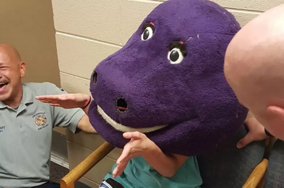 Girl Gets Rescued After She Gets Stuck in Barney Head [VIDEO]