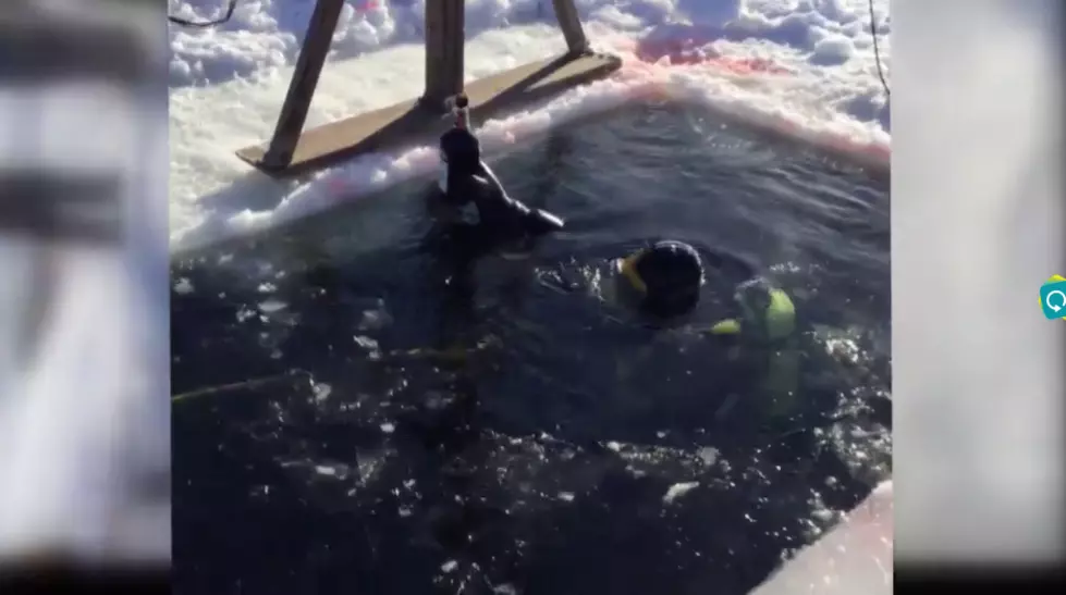 #WickedFunny: Scuba Diver Salvaging Snow Sled Finds 2 Bottles of Allen’s on the Bottom of a Maine Lake [VIDEO]