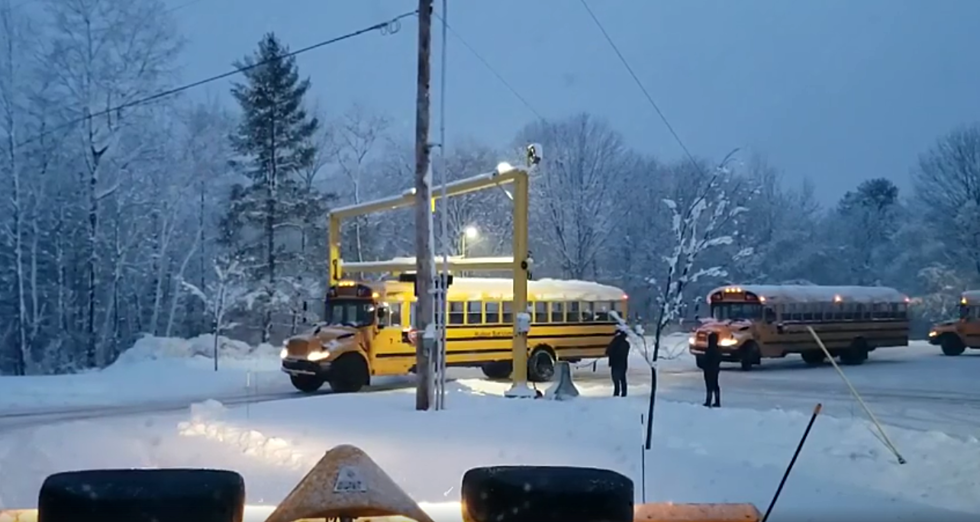 Wicked Maine: Genius Roof Scraper Cleaning Snow Off Buses