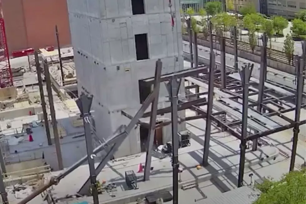 WATCH: Steel Beams Unexpectedly Collapse Injuring 2 Workers 