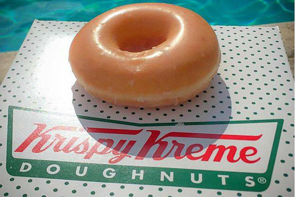 Grab A Dozen Krispy Kreme Doughnuts For A Buck This Friday