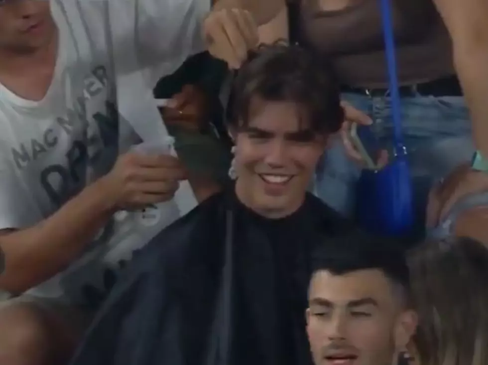 Fan Gets a Haircut During 8th Inning of a Yankee Game